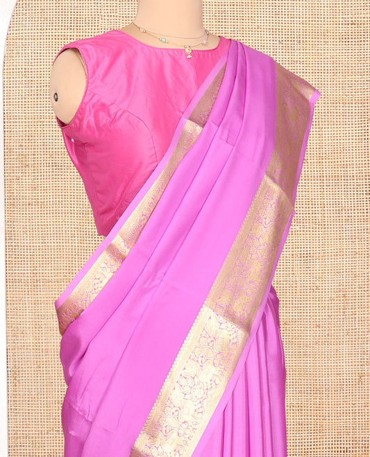 Pink Plain Mysore Silk Saree, Highlighted by a Zari Border of Yaali Designs, Pallu Steeped with Zari Designs, and Paired with a Matching Blouse