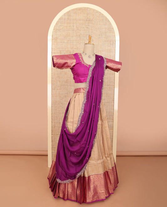 Pale brown floral jacquard half saree with contrast zari design border, floral embroidered blouse & floral embroidery dhavani