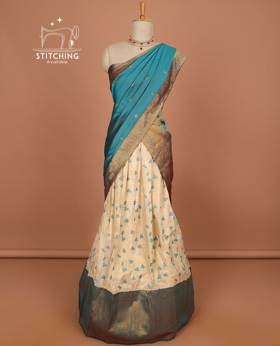 Cream floral buttas half saree with contrast zari border, zari design blouse & blue floral zari design dhavani