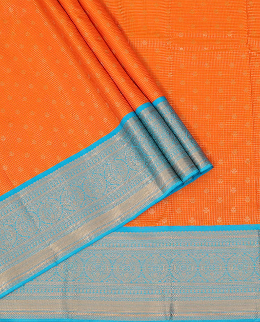 Yellow Art Silk Pavadai Material Set, Finely Woven with Zari Buttas and Zari Checks Skirt, Complemented by a Contrast Traditional Zari Design Border, and Paired with a Contrast Blouse