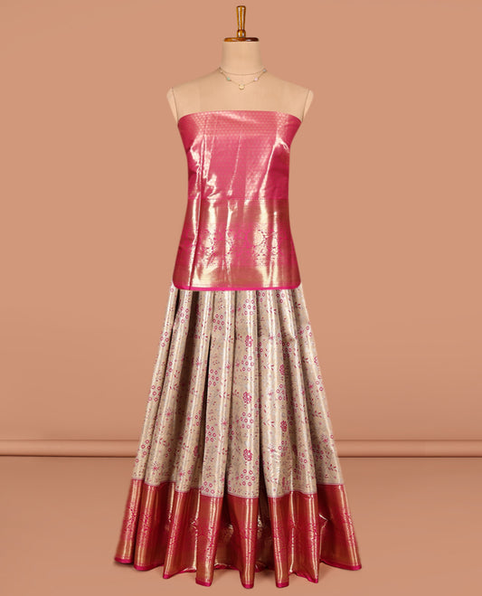 Beige Art Silk Pavadai Material Set, Graced with Jacquard on Its Skirt, Complemented by a Contrast Traditional Zari Designs Border, and Paired with a Contrast Blouse