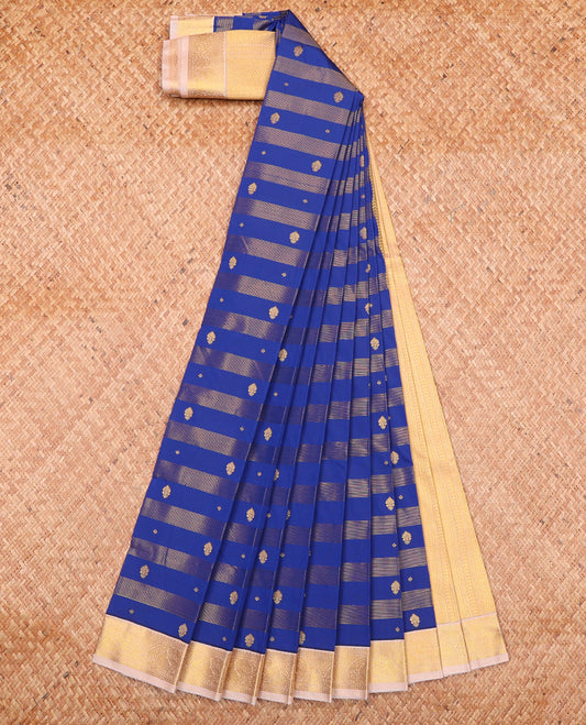 Royal Blue Budget Silk Saree Richly Detailed with Zari Stripes and Zari Buttas, Complemented by a Contrast Peacock Zari Border, Pallu Steeped with Geometric Patterns, and Paired with a Contrast Blouse