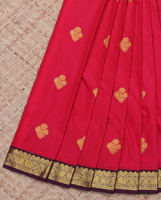 Red Budget Silk Saree, Mesmerized with Zari Buttas All Over Its Body, Complemented by a Contrast Traditional Zari Design Border of Peacocks, Pallu Features Geometric Designs, and Paired with a Contrast Blouse