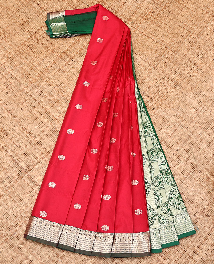 Red Budget Silk Saree, Decked Up with Round Buttas All Over Its Body, Complemented by a Contrast Traditional Zari Border, Grand Floral Design Pallu, and Paired with a Contrast Blouse