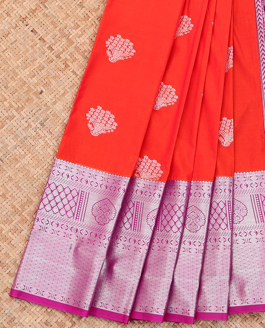 Red Budget Silk Saree, Mesmerized with Zari Buttas on Its Body, Complemented by a Contrast Traditional Zari Design Border, Pallu Steeped with Floral Designs, and Paired with a Contrast Blouse