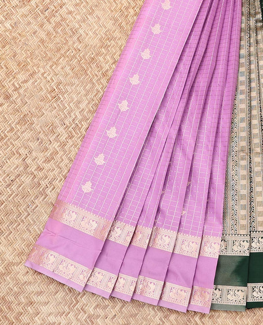 Pink Budget Silk Saree Features Buttas and Checks, Highlighted by a Traditional Rettai Pettu Border, Contrast Grand Pallu, and a Contrast Blouse