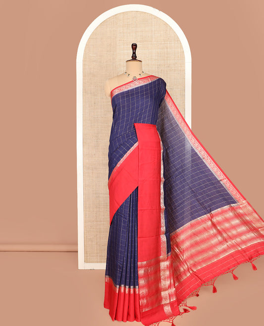 Navy Blue Assam Silk Saree Detailed with Zari Checks on Its Body, Complemented by a Contrast Traditional Zari Design Woven Border, Scintillating Pallu of Zari Stripes, and Paired with a Contrast Blouse