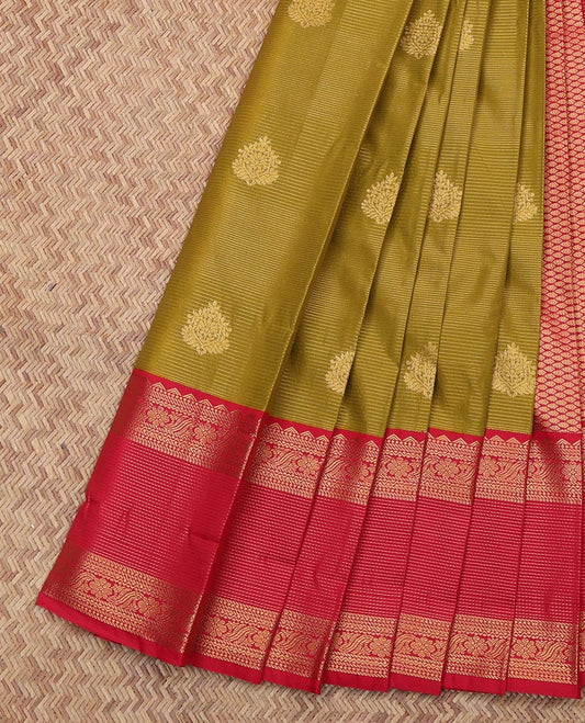 Green Budget Silk Saree, Subtly Sparkled With Zari Buttas and Stripes All Over Its Body, Complemented by Contrast Traditional Zari Designs Woven Border, Grand Jaal Pallu and Paired with a Contrast Blouse