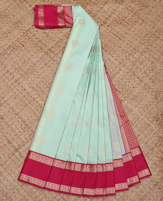 Turquoise Budget Silk Saree, Subtly Woven with Zari Buttas All Over Its Body, Complemented by a Contrast Traditional Zari Design Rettai Pettu Border, Pallu of Jaal Designs, and Paired with a Contrast Blouse
