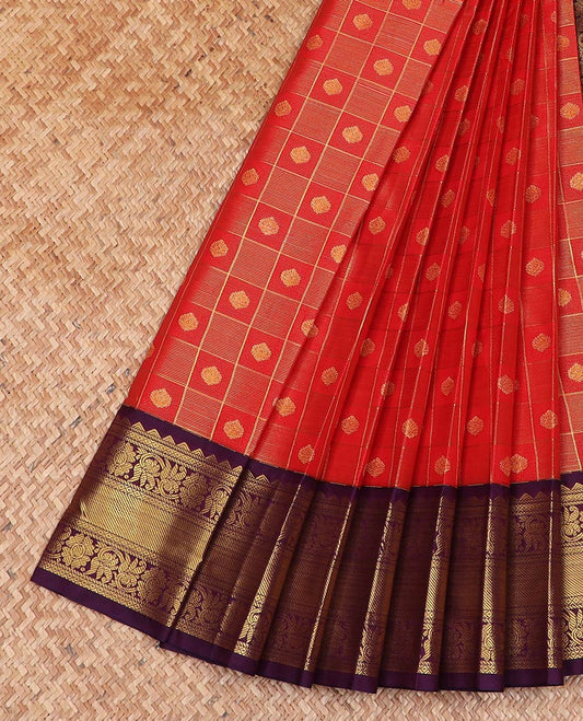 Red butta enclosed checked gift saree, contrast traditional zari design border, and ogee patterned pallu