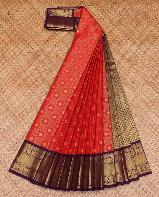 Red butta enclosed checked gift saree, contrast traditional zari design border, and ogee patterned pallu