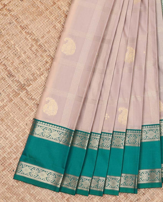 Grey Budget Silk Saree Decked Up with Paisley Buttas Enclosed Checks, Complemented by a Contrast Traditional Zari Design Rettai Pettu Border, Zari Woven Pallu of Jaal Designs, and Paired with a Contrast Blouse