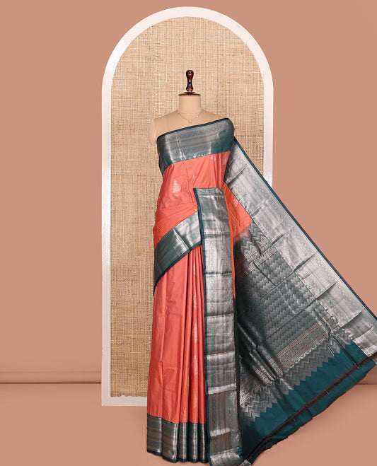 Dark Peach Budget Silk Saree, Gracefully Embellished with Zari Buttas All Over Its Body, Complemented by Contrast Border of Traditional Designs Woven in Zari, Opalescently Detailed Pallu, and Paired with a Contrast Blouse