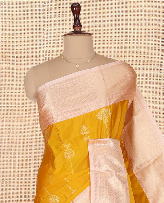 Yellow Budget Silk Saree, Subtly Sparkled with Zari Buttas on Its Body, Complemented by a Contrast Traditional Zari Design Border, Intricately Designed Pallu, and Paired with a Contrast Blouse