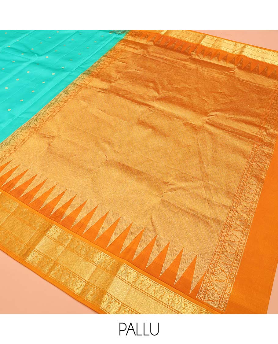 Turquoise buttas Bangalore silk saree, contrast temple traditional zari border, and pallu of jaal designs