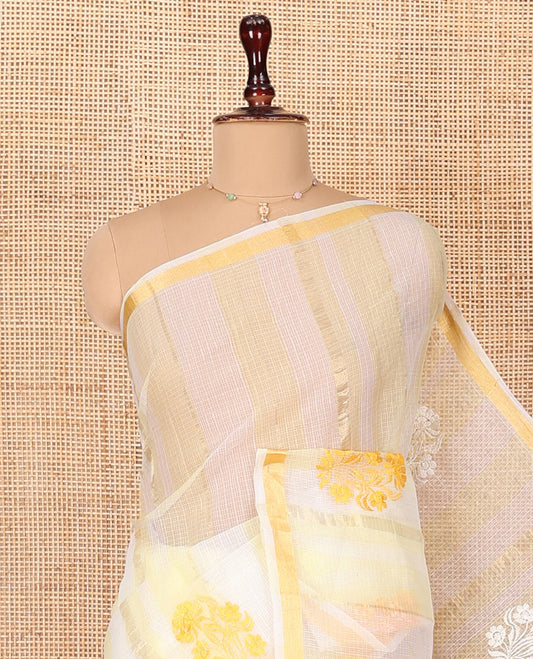 White and Yellow Kota Cotton Saree, Mesmerized with Stripes and Floral Motifs Thread Embroidery on Its Body, Piping Border, Pallu Features Floral Embroidery, and Paired with a Matching Blouse