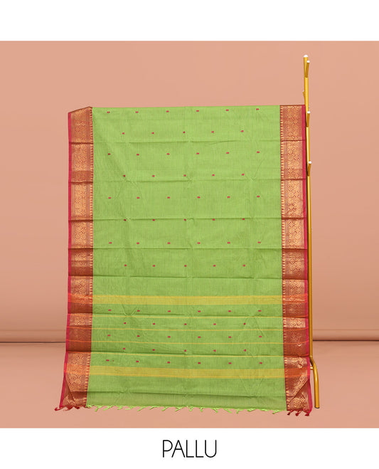 Green Chettinad Cotton Saree, Adorned with Buttas All Over Its Body, Complemented by a Contrast Traditional Zari Design Border, Pallu of Stripes, and Paired with a Matching Blouse