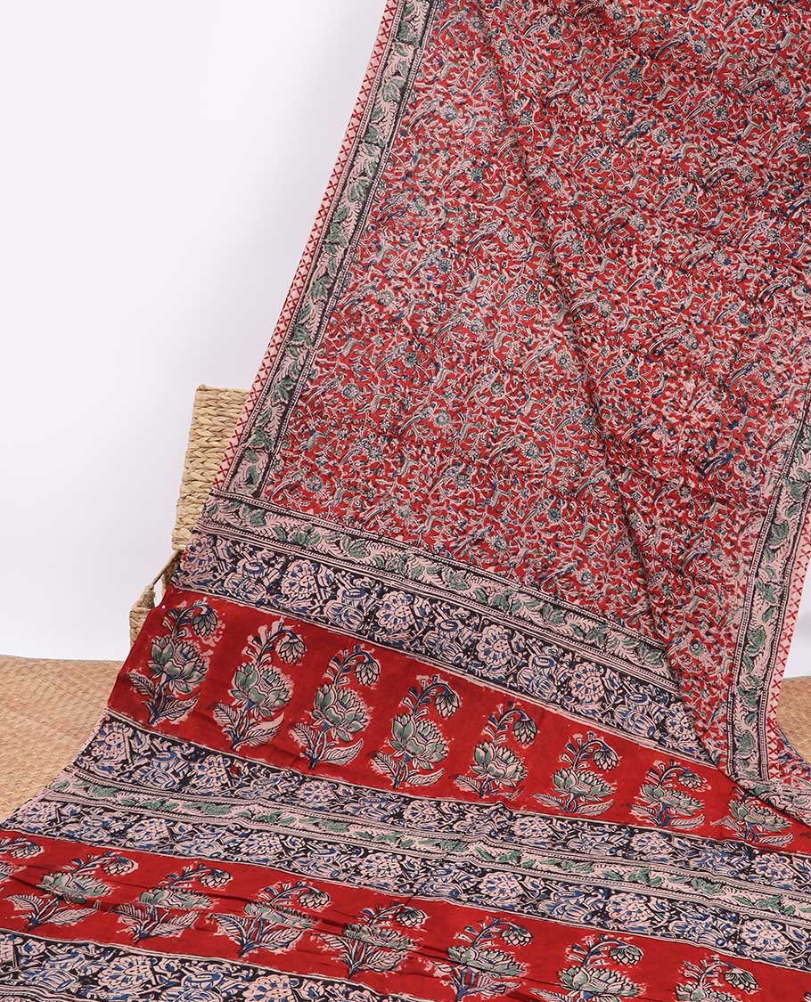 Red floral design machine-printed kalamkari cotton saree with contrast floral border & intricate floral design pallu