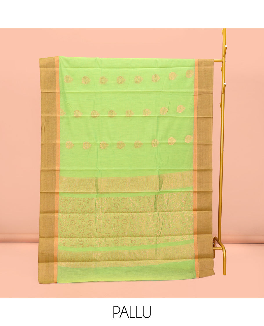 Green Semi-Silk Cotton Saree, Sparsely Woven with Zari Buttas All Over Its Body, Complemented by Contrast Border, Pallu of Intricate Zari Design, and Paired with a Matching Blouse