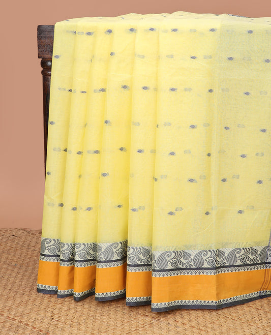 Lemon yellow thread buttas woven Bengal cotton saree, contrast rettai pettu border of paisleys, and striped pallu