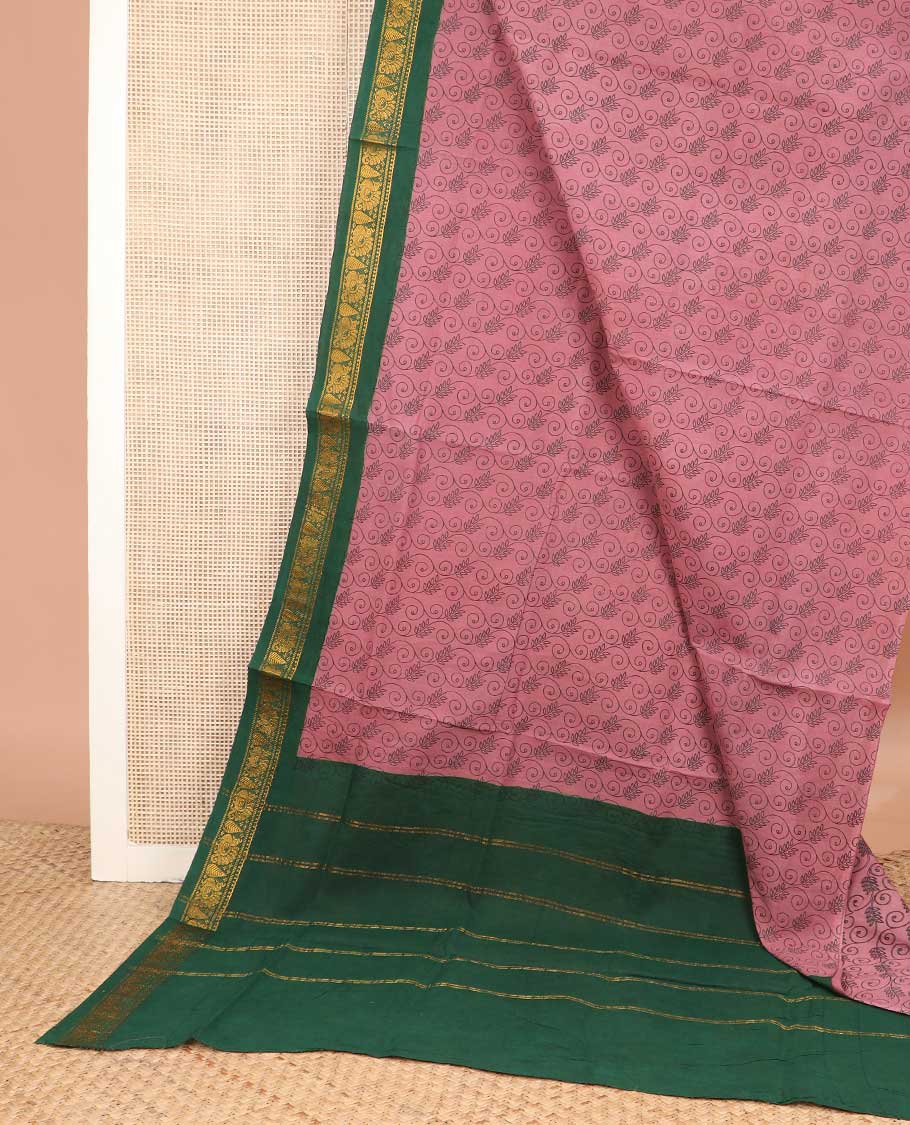 Pink floral vine printed sungudi cotton saree, contrast traditional border, and zari striped pallu