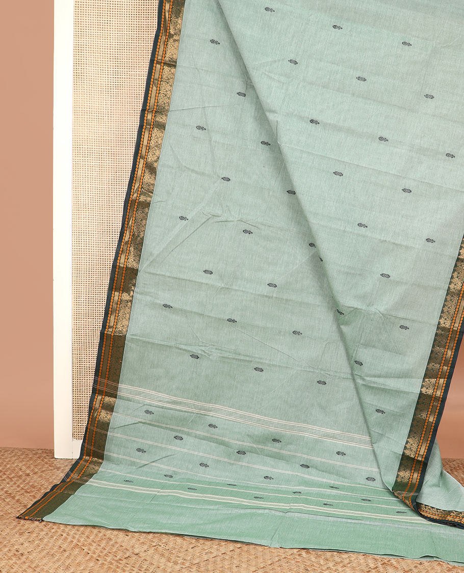 Pastel green thread buttas Chettinad cotton saree, contrast traditional design border, and striped pallu