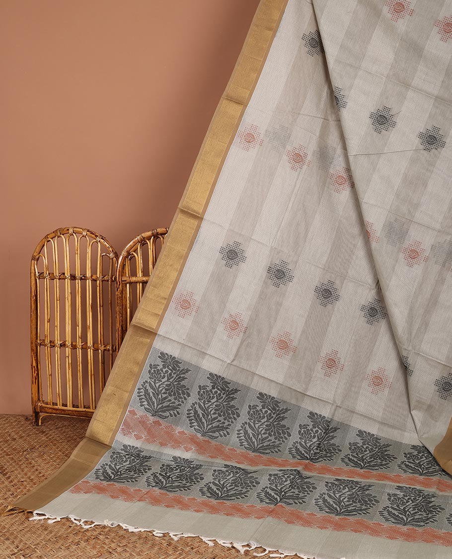 Brown striped Coimbatore cotton saree with buttas, zari border & floral design pallu