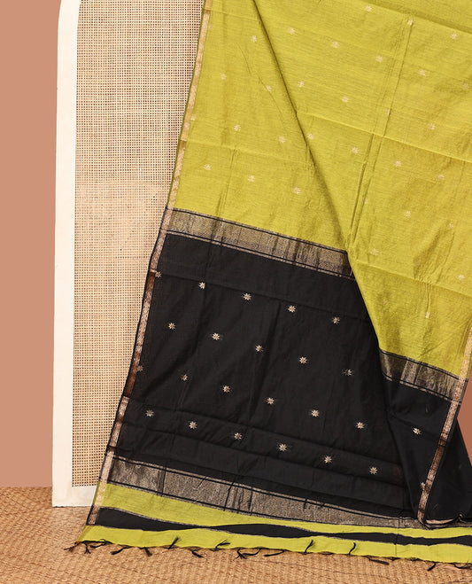 Green Maheshwari Cotton Saree, Mesmerized with Flower Buttas All Over Its Body, Subtly Woven Piping Border, Captivating Contrast Pallu Steeped with Buttas, and Paired with a Contrast Blouse