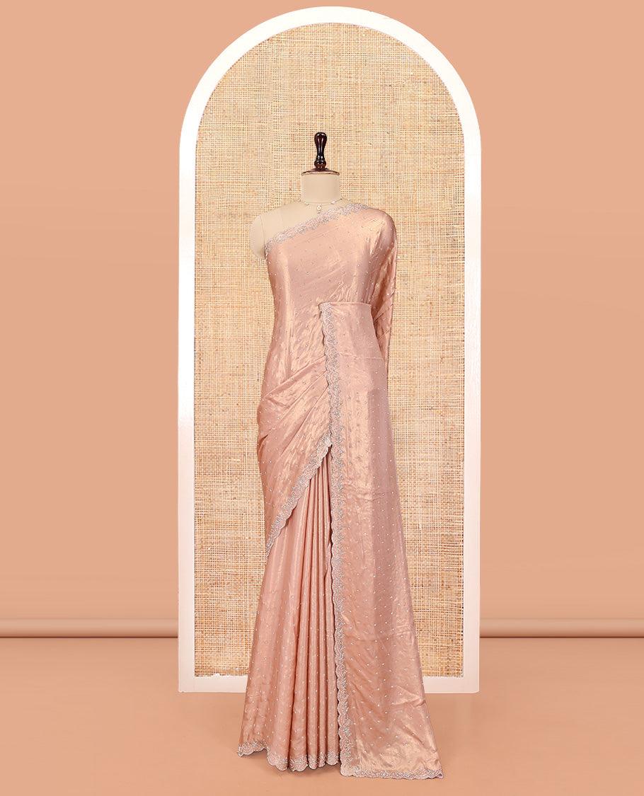 Rose Gold  Designer Saree, Gleamed up with Stone Struck All Over Its Body, Scallop Stone Embroidered Border, and Heavy Embroidered Matching Blouse