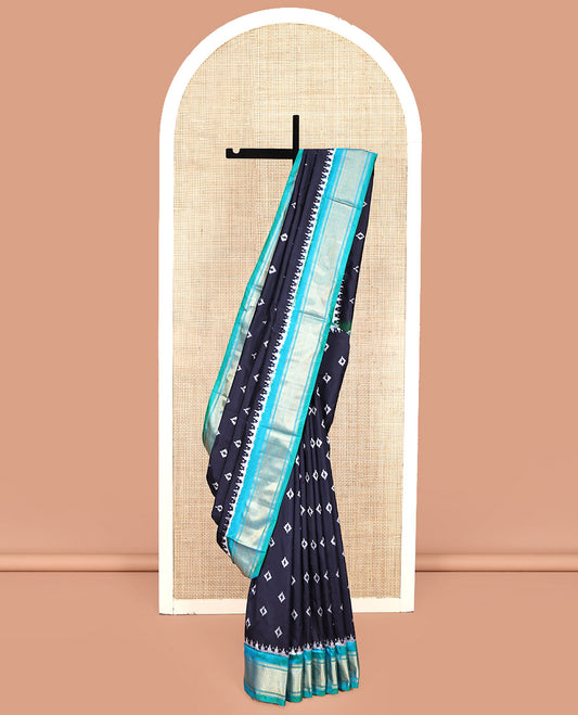 Blue Pochampally Ikat Silk Saree, Accentuated with Ikkat Buttas on Its Body, Complemented by Contrast Temple Traditional Design Border, Pallu of Intricate Patterns, and Paired with a Contrast Blouse