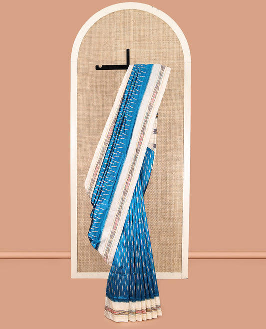 Blue Pochampally Ikat Silk Saree, Ornamented with Ikat Buttas, Complemented by a Contrast Ikat Border, Ikat-Style Pallu, and No Blouse