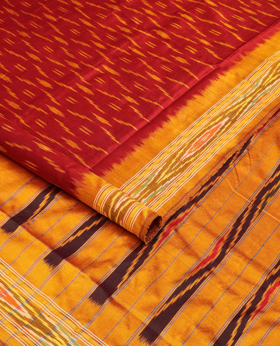 Red ikkat saree with unique buttas, contrast ikkat border & pallu of ikkat designs