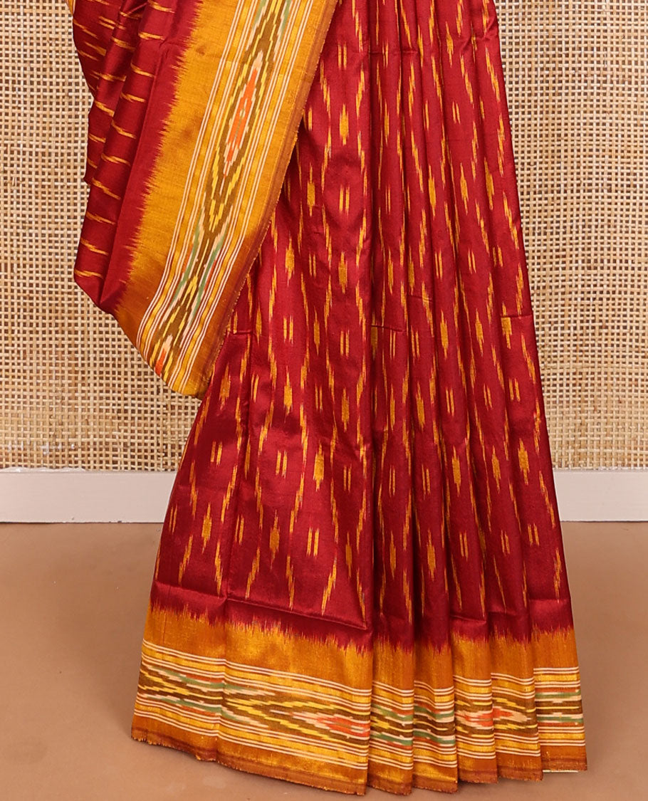 Red ikkat saree with unique buttas, contrast ikkat border & pallu of ikkat designs