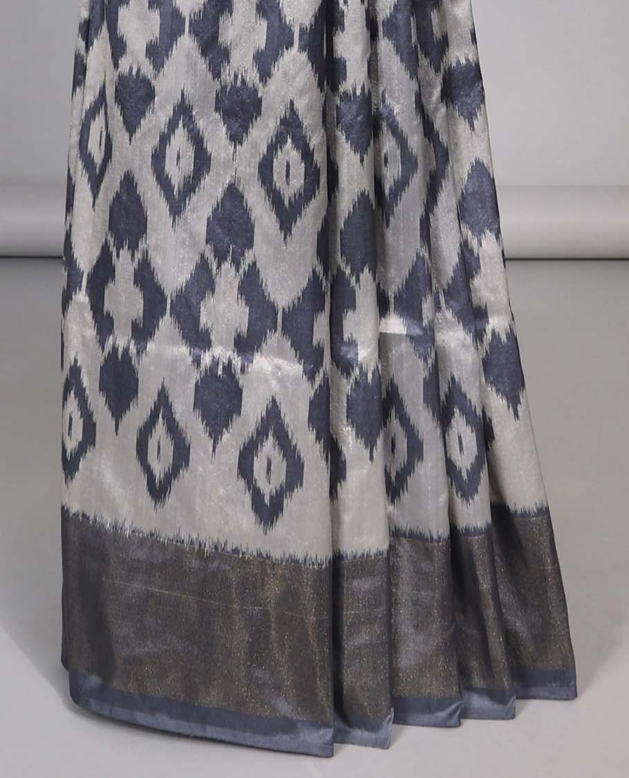 Grey ogee design ikkat silk saree with contrat plain border & argyle design pallu