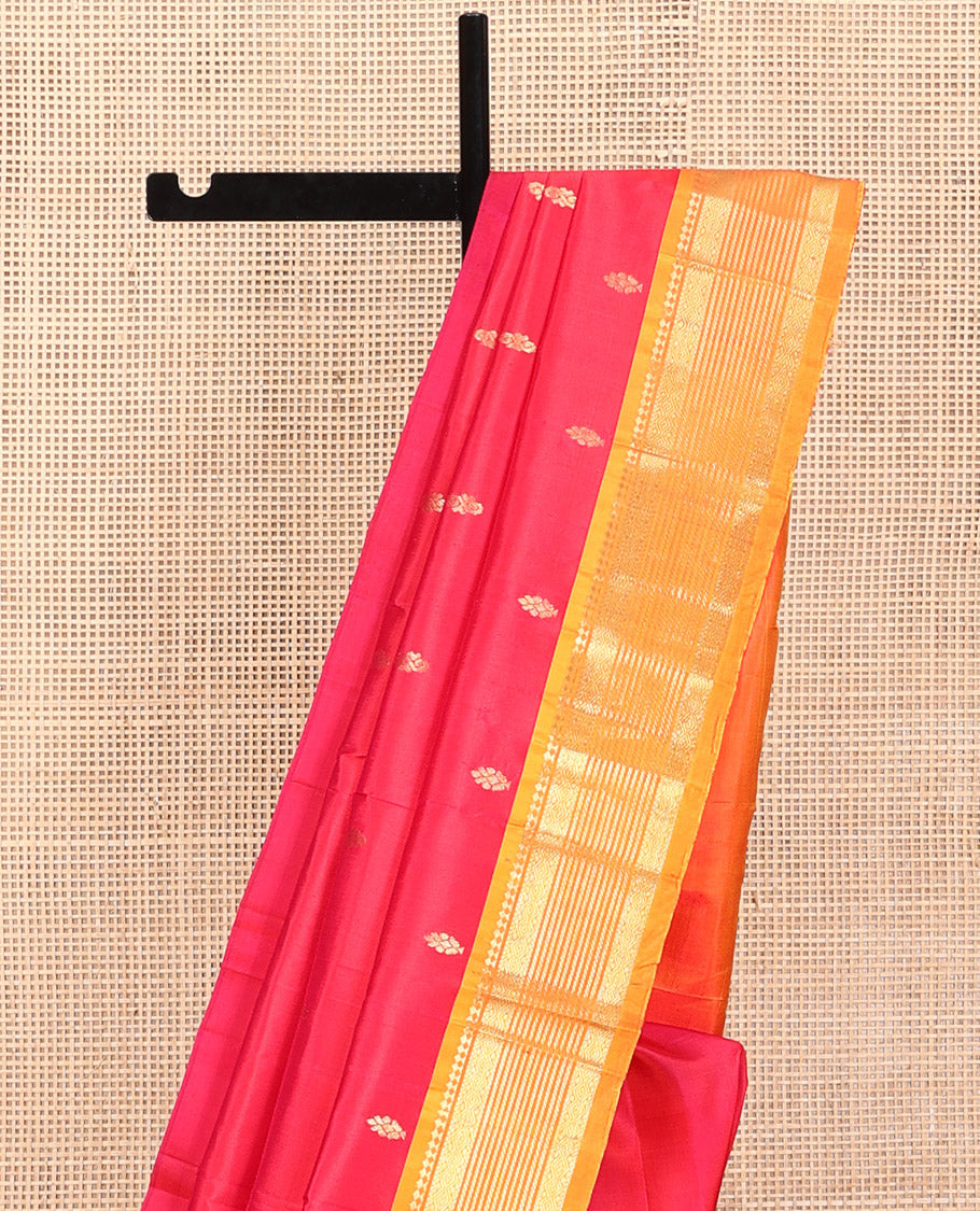 Red Kanchipuram Silk Saree, Decked Up with Buttas, a Contrast One-Sided Traditional Zari Border, Zari-Woven Pallu, and No Blouse