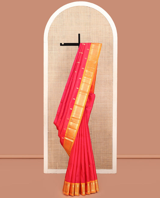 Red Kanchipuram Silk Saree, Decked Up with Buttas, a Contrast One-Sided Traditional Zari Border, Zari-Woven Pallu, and No Blouse