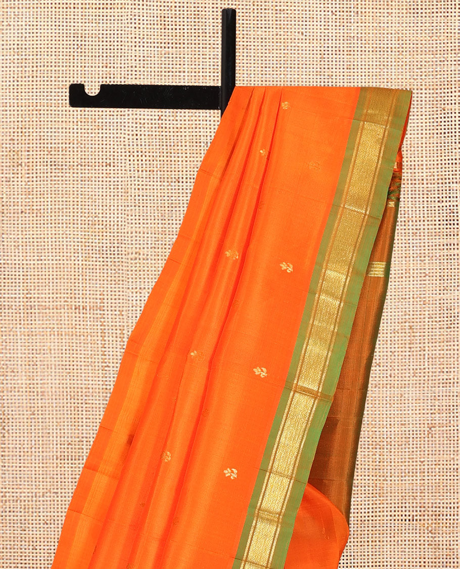 Orange Kanchipuram Silk Saree, Detailed with Zari Buttas, Complemented by a Contrast Border of Banaras and Mayil Kann Design, Pallu of Zari Design, and No Blouse