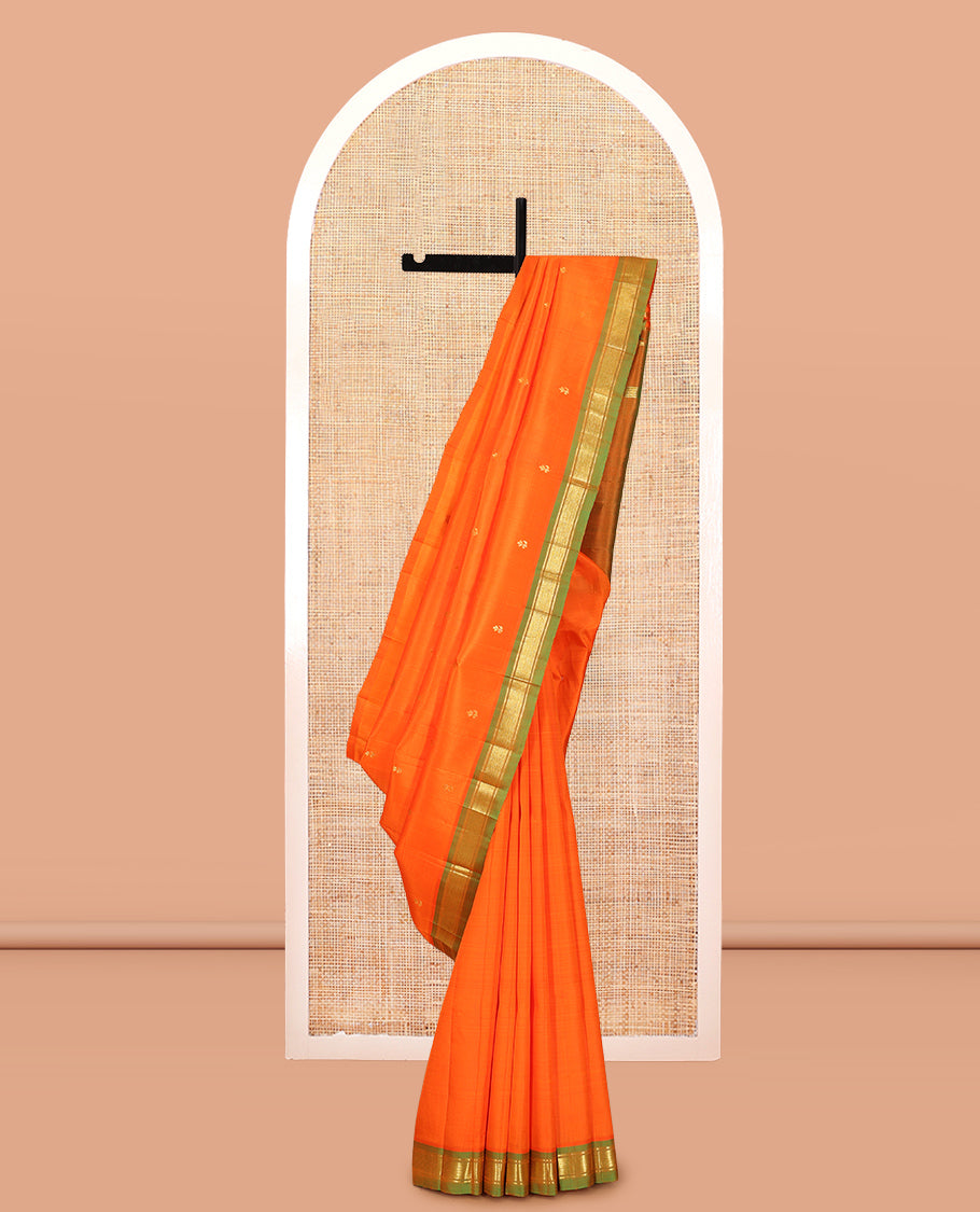 Orange Kanchipuram Silk Saree, Detailed with Zari Buttas, Complemented by a Contrast Border of Banaras and Mayil Kann Design, Pallu of Zari Design, and No Blouse