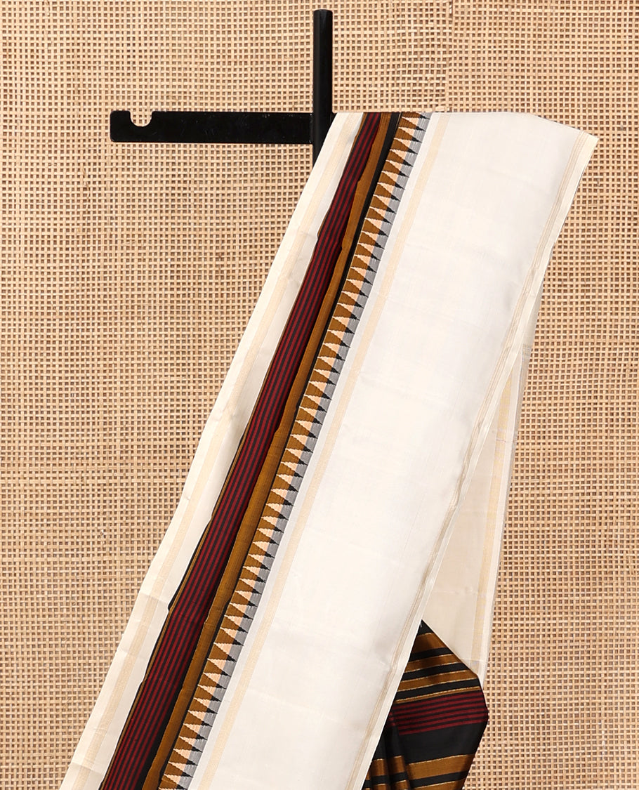 Black Striped Kanchipuram Silk Saree, Complemented by a Contrast Bodi Thazampoo Rekku Border, Zari Striped Pallu, and a Contrast Blouse