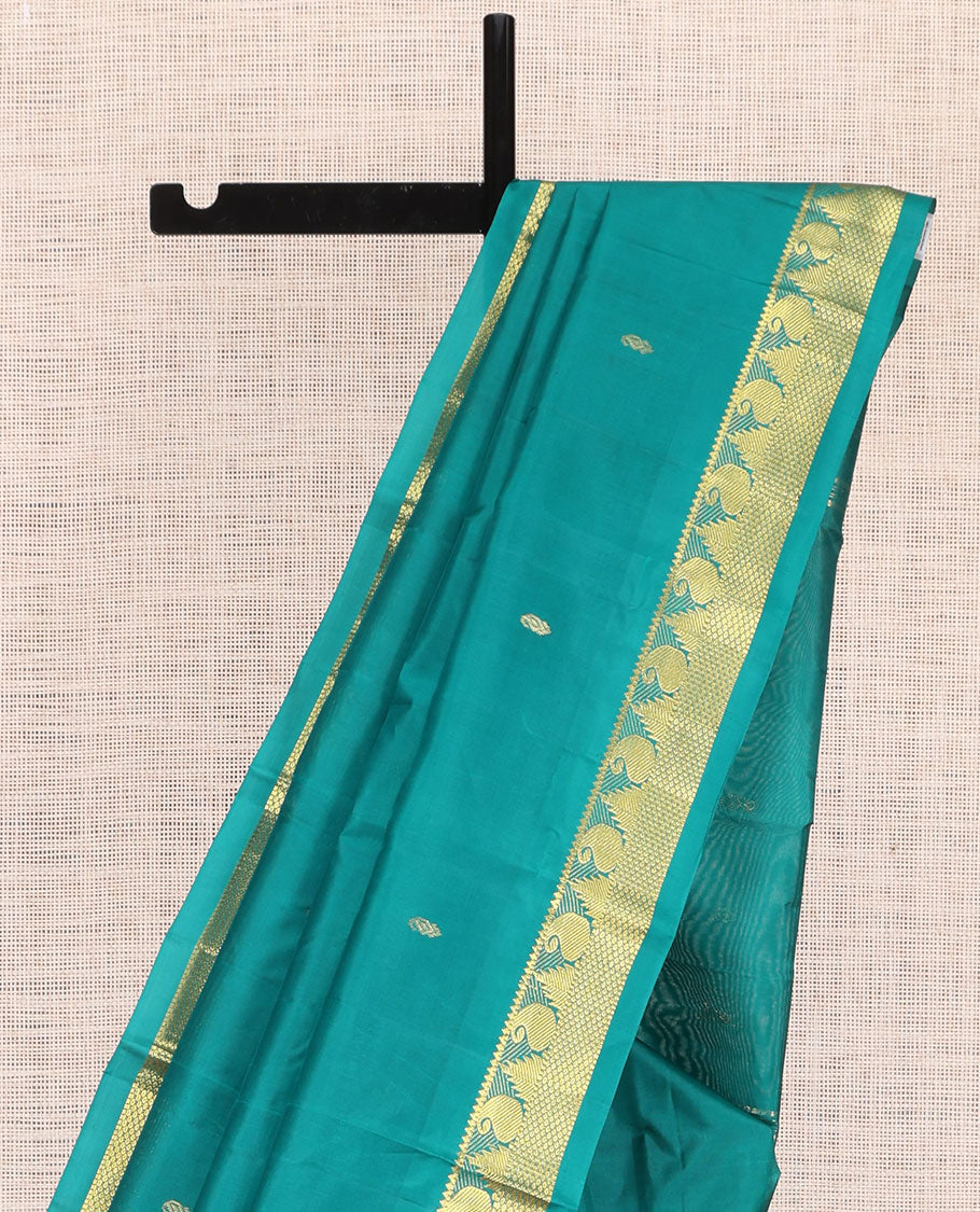 Green Kanchipuram Silk Saree, Woven with Zari Buttas, Highlighted by Zari Border of Rekku, Muthu, Manga, and Mayil Kann Designs, Pallu of Zari Design, and a Matching Blouse