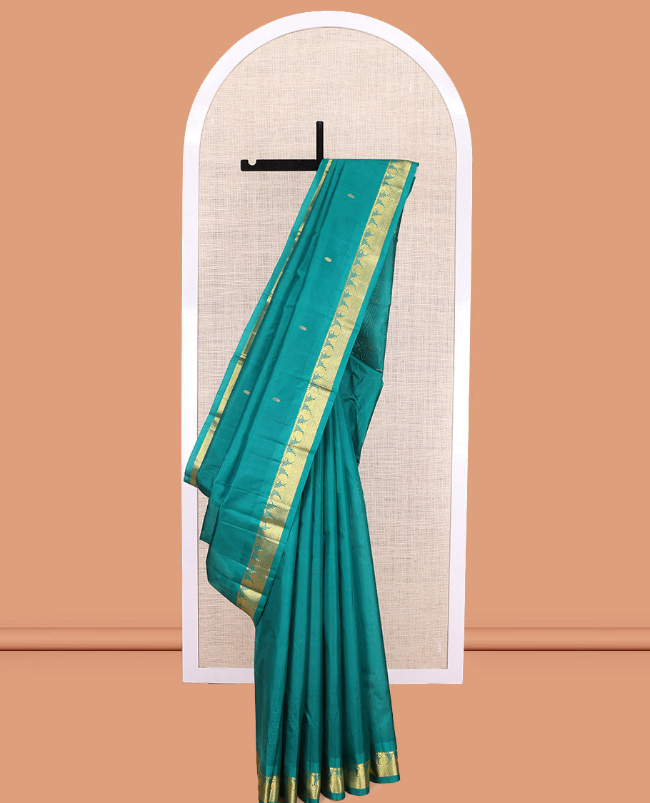 Green Kanchipuram Silk Saree, Woven with Zari Buttas, Highlighted by Zari Border of Rekku, Muthu, Manga, and Mayil Kann Designs, Pallu of Zari Design, and a Matching Blouse