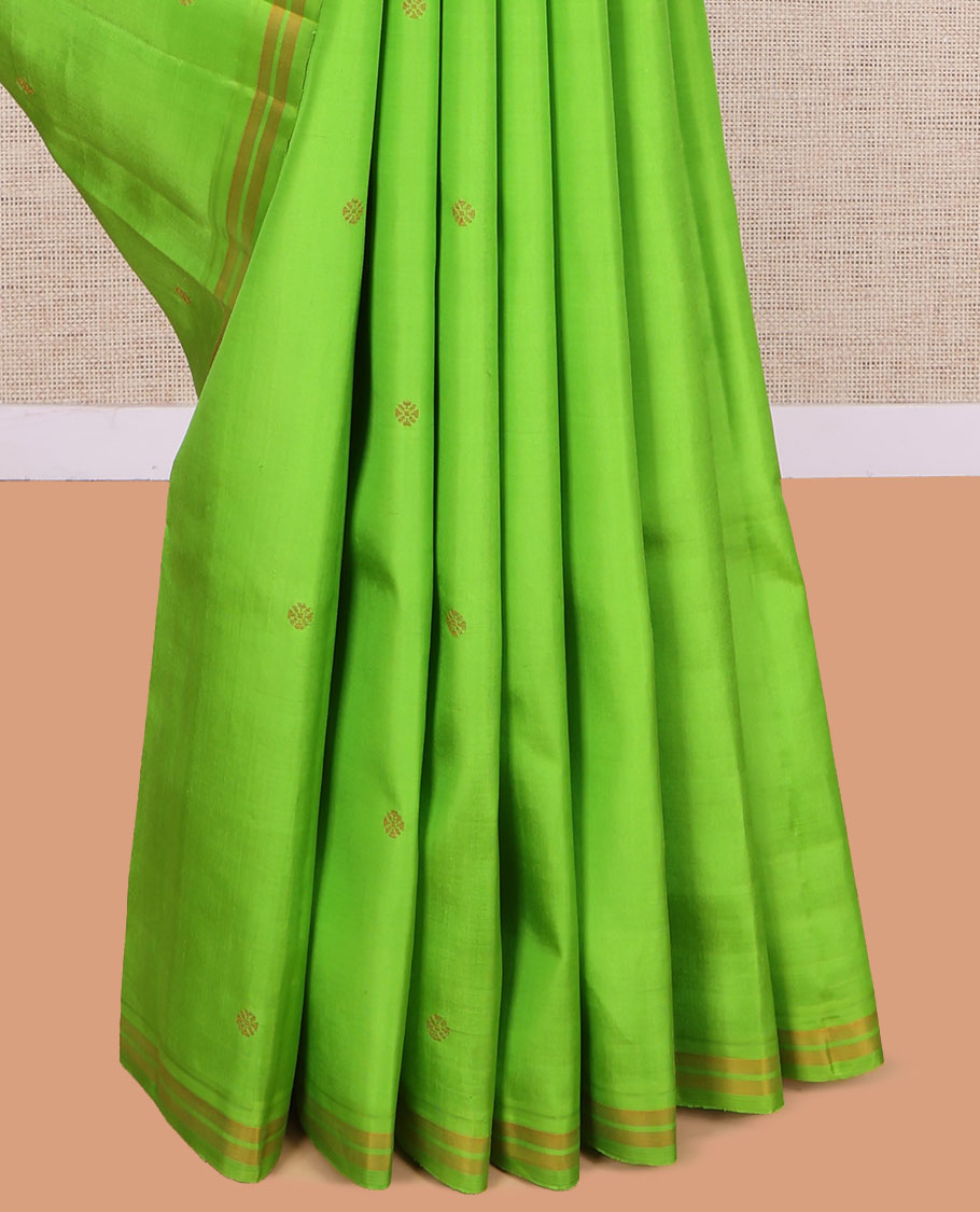 Green Kanchipuram Silk Saree, Subtly Woven with Buttas, a Piping Border, Pallu of Peacock Designs, and a Matching Blouse