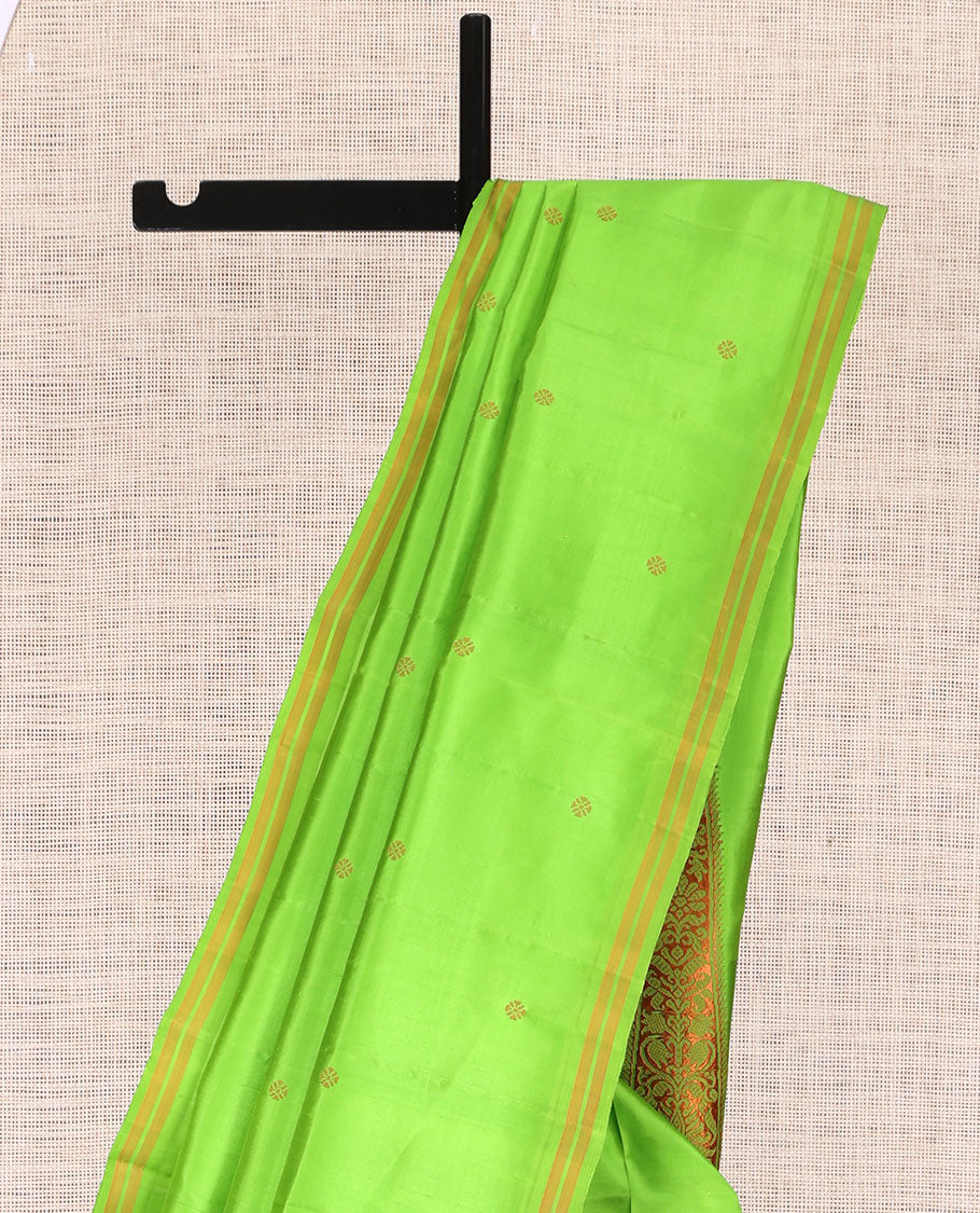 Green Kanchipuram Silk Saree, Subtly Woven with Buttas, a Piping Border, Pallu of Peacock Designs, and a Matching Blouse
