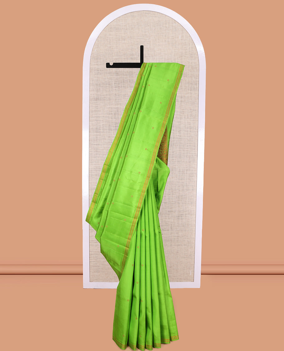 Green Kanchipuram Silk Saree, Subtly Woven with Buttas, a Piping Border, Pallu of Peacock Designs, and a Matching Blouse
