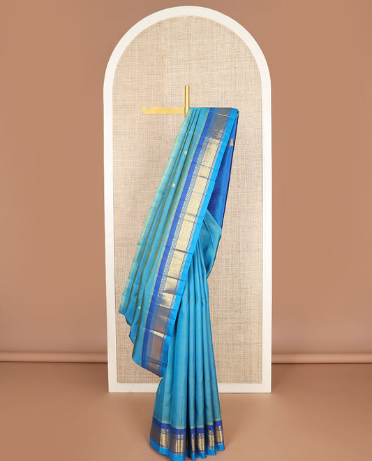 Blue zari buttas kanchipuram silk saree, contrast one-sided border of paneer sombu,banaras & jaal design & zari design pallu
