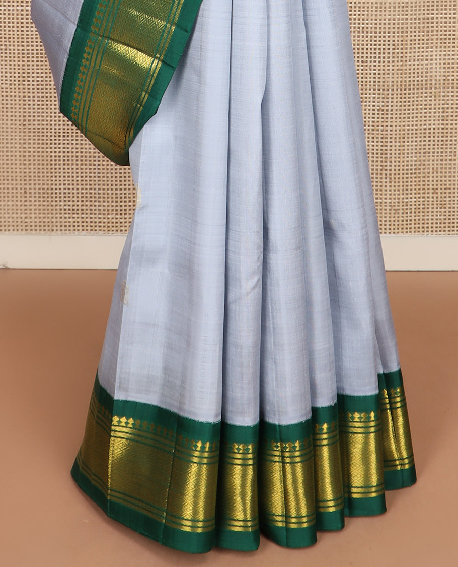 Grey zari buttas Kanchipuram silk saree, contrast one-sided korvai border of paneer sombu, banaras, and jaal design, and zari design pallu