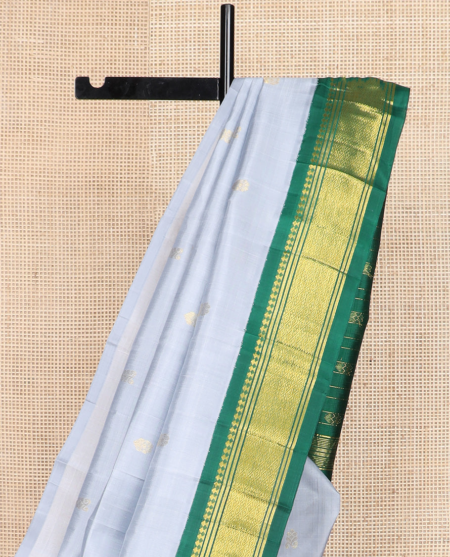 Grey zari buttas Kanchipuram silk saree, contrast one-sided korvai border of paneer sombu, banaras, and jaal design, and zari design pallu