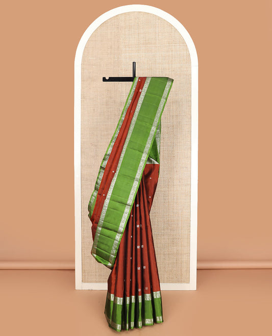 Orange annam chakram buttas Kanchipuram silk saree, contrast rettai pettu border of mayil, and kodi visiry designs, and jaal pallu