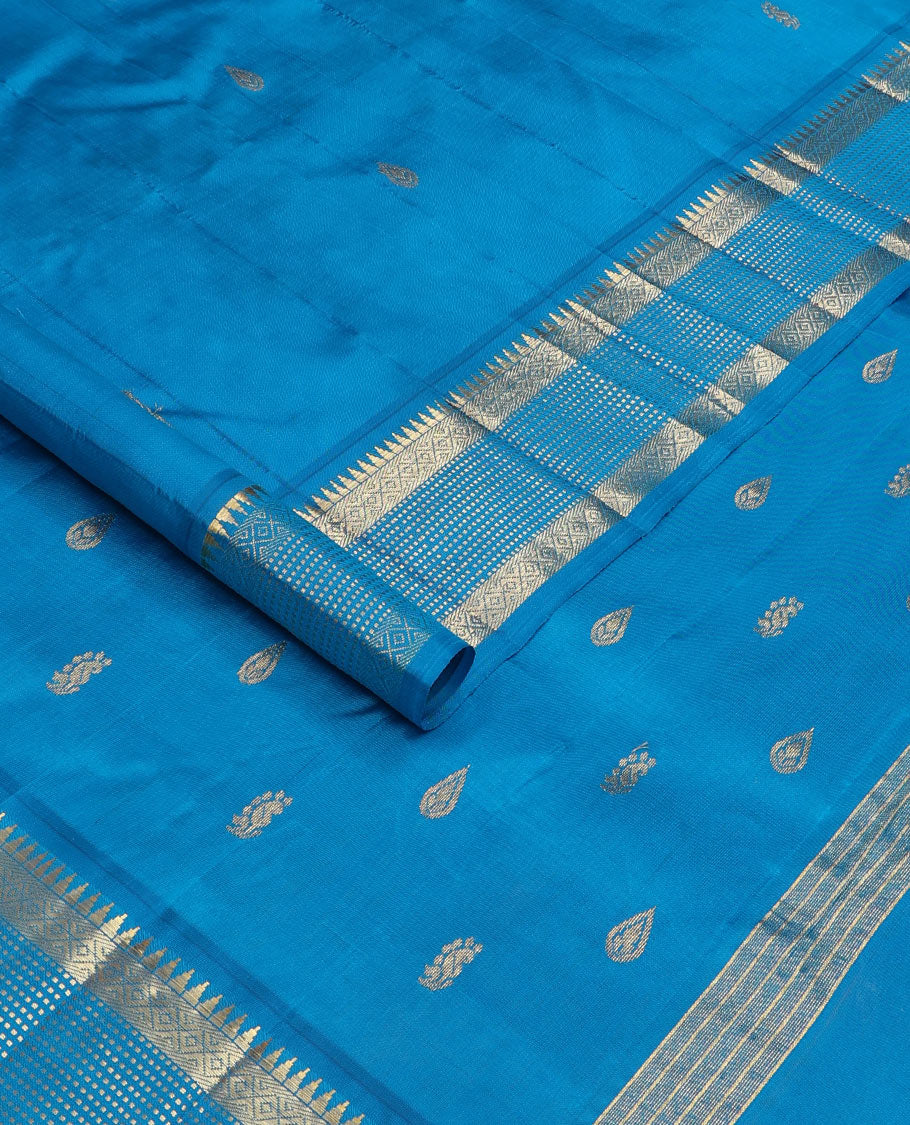 Blue zari buttas Kanchipuram silk saree, one-sided zari border of rekku, banaras, diamond, and muthu designs , and zari design pallu