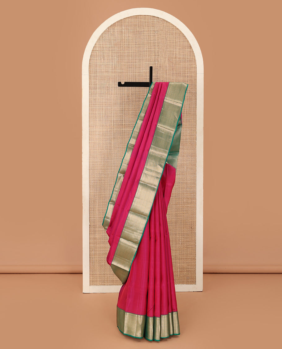 Red plain Kanchipuram silk saree, contrast border of thilakam, banaras, kuyil kann, and rudraksham designs, and jaal pallu